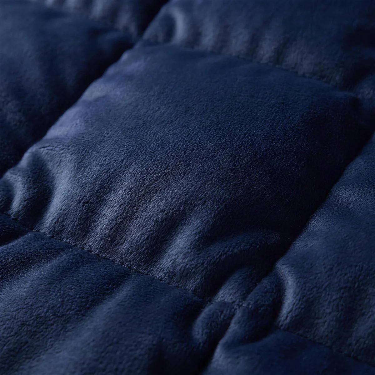 Close-up texture detail of the Aploomb Weighted Blanket quilted fabric