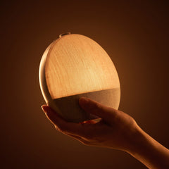 Aploomb Sunrise Alarm Clock glowing warm amber light