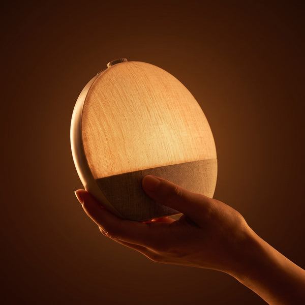 Aploomb Sunrise Alarm Clock glowing warm amber light