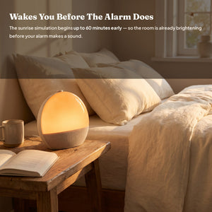 Wakes You Before The Alarm Does — sunrise simulation on a bedside nightstand
